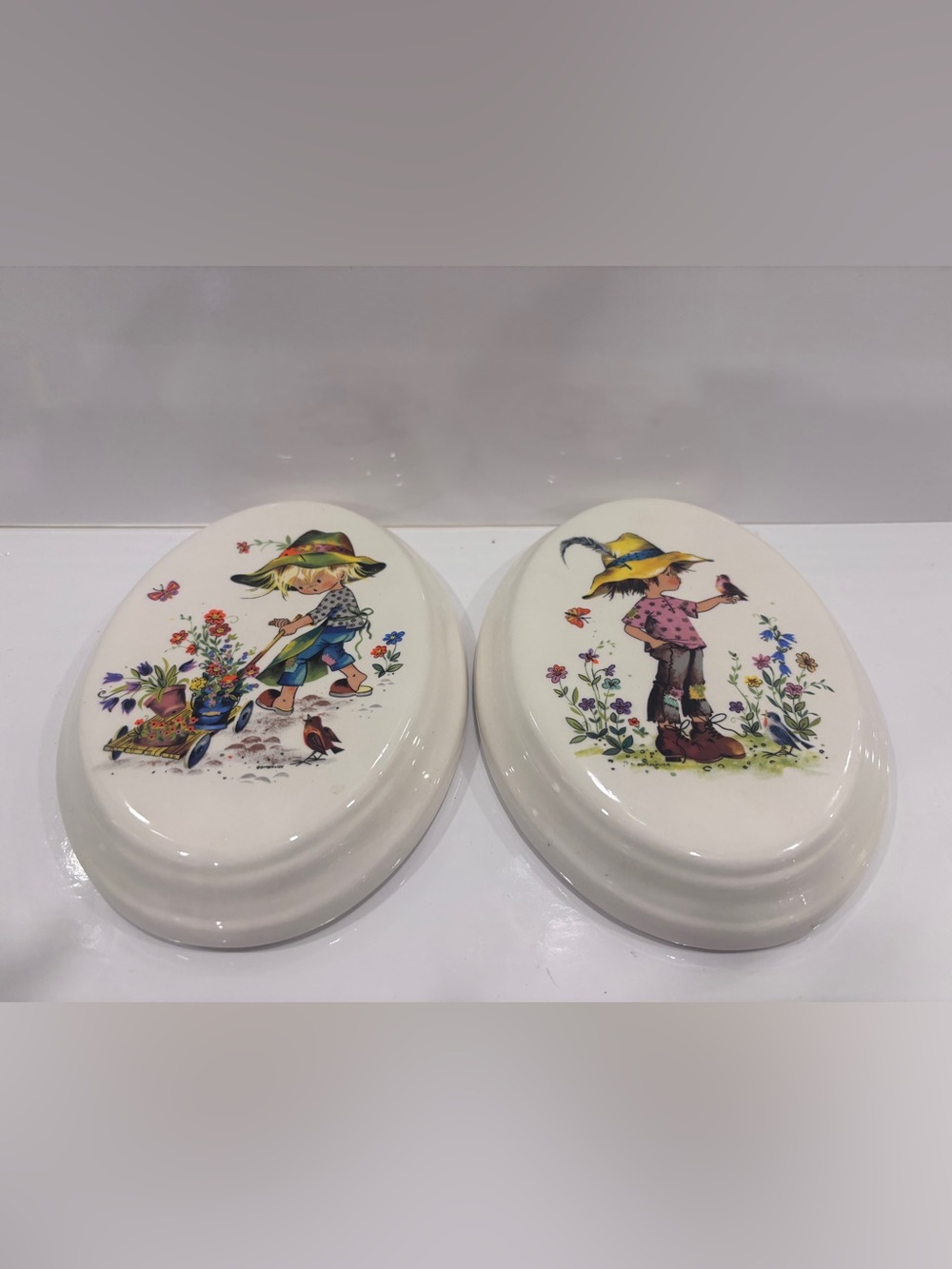 Vintage ceramic wall plaque pair-children &floral design - 7”